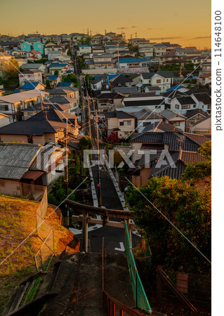 A photo of Toganojinja Shrine, a shrine that stands on a mountain in the solitary area of Hashimoto Kibougaoka, Yawata City, taken in the evening. A photo of Toganojinja Shrine, a shrine that stands on a mountain in the solitary area of Hashimoto Kibougaoka, Yawata City, taken in the evening. 114648100