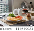 Breakfast with omelette 114649083