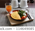 Breakfast with omelette 114649085