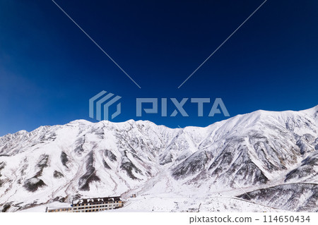 Aerial view of the mountain hut and Mount Tsurugi from above the Dodaira Enmadai Observatory. Mount Tateyama, Mount Tsurugi-Gozen, Mount Fujinooritate Aerial view of the mountain hut and Mount Tsurugi from above the Dodaira Enmadai Observatory. Mount Tateyama, Mount Tsurugi-Gozen, Mount Fujinooritate 114650434