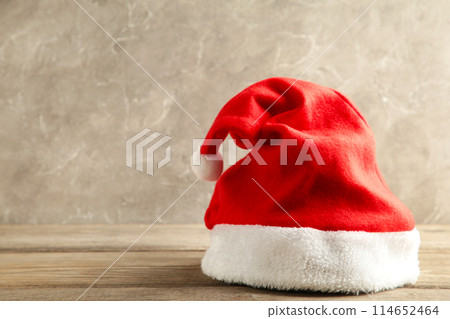 Santa Claus red hat on grey concrete background 114652464