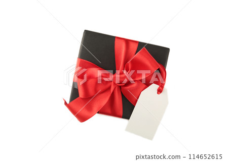 Black gift box with sale tag isolated on white background 114652615