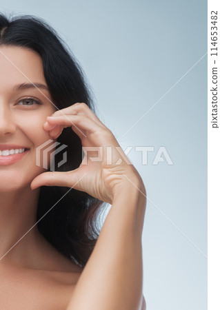 Smiling Woman Highlighting Oral Care Smiling Woman Highlighting Oral Care 114653482