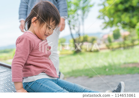 Children and moms (girls, toddlers, kindergarteners) playing and exercising on park playground equipment Children and moms (girls, toddlers, kindergarteners) playing and exercising on park playground equipment 114653861