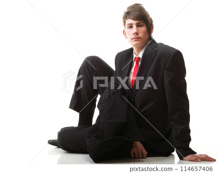young businessman black suit casual tie on white background young businessman black suit casual tie on white background 114657406