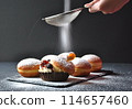 Hanukkah celebration concept. Tasty donuts 114657460