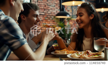 Friends in a cafe enjoying delicious pizza, meeting old friends in a cafe at a party, pizzeria advertising Friends in a cafe enjoying delicious pizza, meeting old friends in a cafe at a party, pizzeria advertising 114658740
