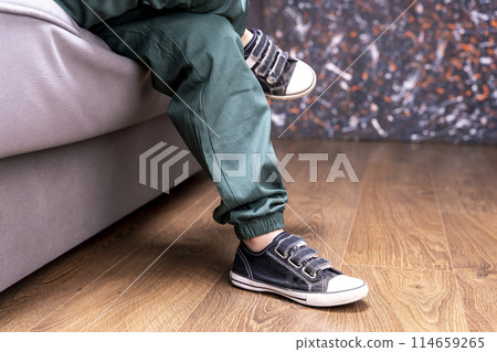 casual comfortable children's clothing. pants and sneakers 114659265