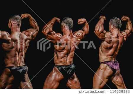 group bodybuilder athlete show back double biceps for bodybuilding competition group bodybuilder athlete show back double biceps for bodybuilding competition 114659383