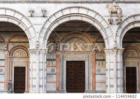 ornate medieval church entrance with stone arches ornate medieval church entrance with stone arches 114659682