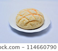 Freshly baked melon bread on a white plate 114660790