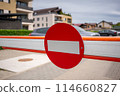 Road to private apartment complex blocked by prominent stop sign 114660827