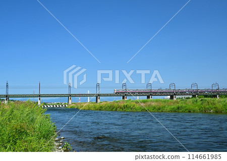 Keio Train across the Tama River 114661985