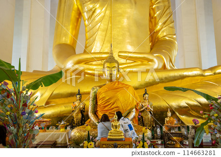 Golden buddha statue at temple in Ang Thong Golden buddha statue at temple in Ang Thong 114663281