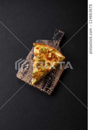 Delicious quiche with broccoli, cheese, chicken, spices and herbs 114663678
