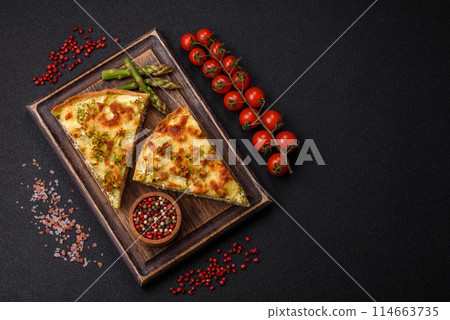 Delicious quiche with broccoli, cheese, chicken, spices and herbs Delicious quiche with broccoli, cheese, chicken, spices and herbs 114663735