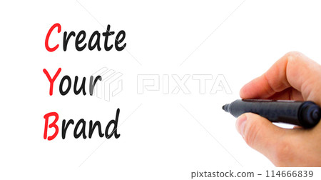 CYB Create your brand symbol. Concept words CYB Create your brand on beautiful white paper. Beautiful white background. Businessman hand. Business CYB Create your brand concept. Copy space. 114666839