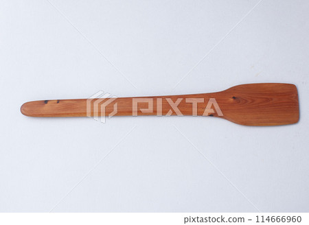 Wooden kitchen utensils stacked view, spoon and spatula close up Wooden kitchen utensils stacked view, spoon and spatula close up 114666960