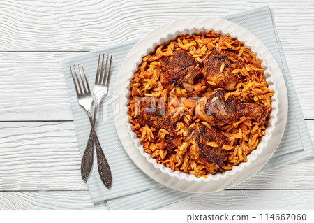 baked greek chicken orzo stew in tomato sauce 114667060