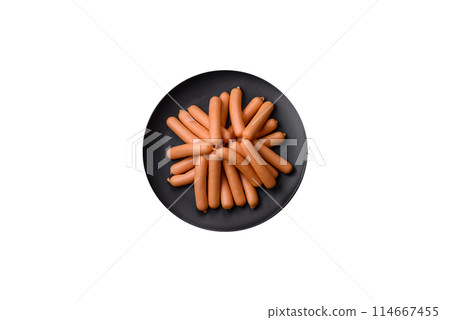 Delicious vegetarian or vegan sausages with salt, spices and herbs 114667455