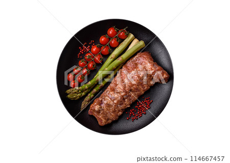 Raw pork ribs marinated with salt, spices and herbs Raw pork ribs marinated with salt, spices and herbs 114667457