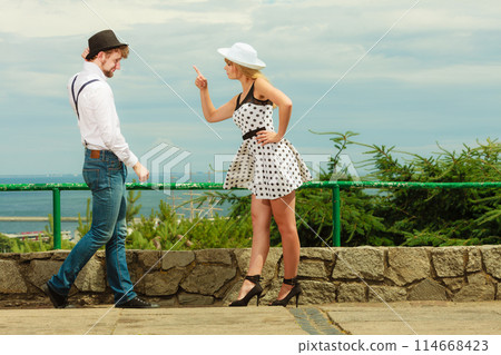 Loving couple retro style flirting outdoor 114668423