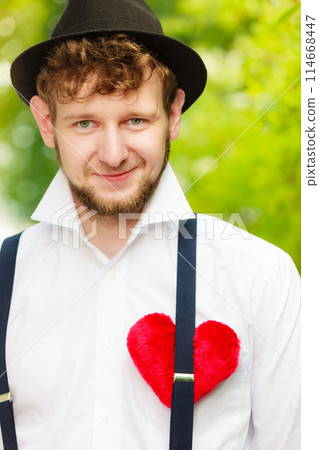 young man retro style with red heart on chest young man retro style with red heart on chest 114668447