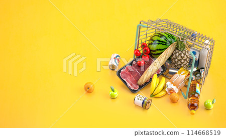 Overturned shopping basket full of variety of grocery products, food and drink ion yellow background. 114668519