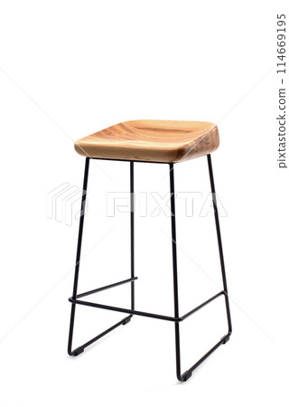 Steel frame high bar stool with a wooden seat. Loft style interior 114669195