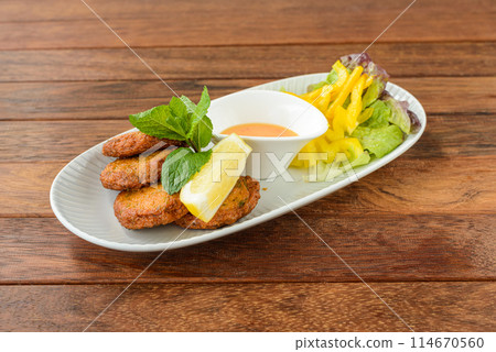Fish Cakes are a delightful and versatile dish Fish Cakes are a delightful and versatile dish 114670560