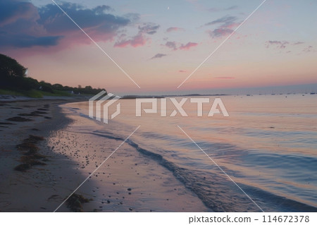 Sunset over calm sea with sandy shore 114672378