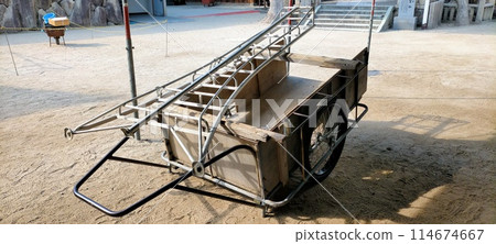 A cart at a construction site 114674667
