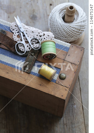 Thread spools in a small box Thread spools in a small box 114675147