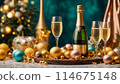 A table with champaigne bottle and glasses is covered with a variety of fruits, oranges and lemons 114675148