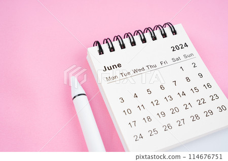 June 2024 month calendar on pink fabric background. June 2024 month calendar on pink fabric background. 114676751