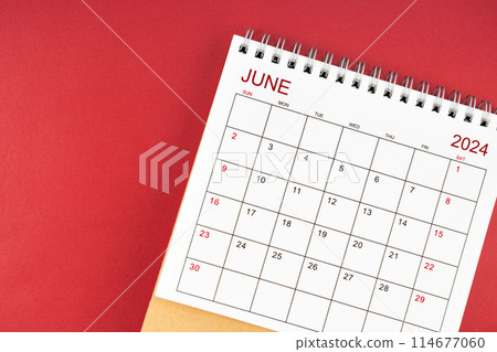 June 2024 desk calendar on red color. 114677060