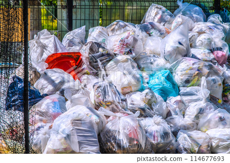 Yokohama cityscape in Japan. Garbage bags (burnable garbage) pile up at the garbage dump (garbage collection area)... = Yokohama city 114677693