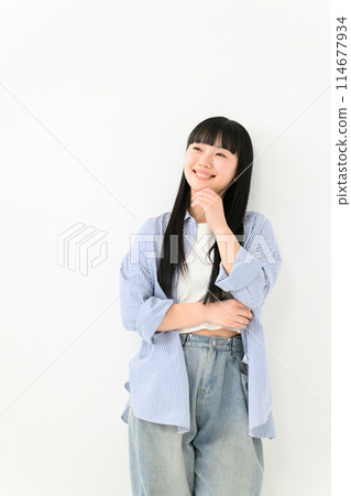 Portrait of a high school girl in casual clothes Portrait of a high school girl in casual clothes 114677934