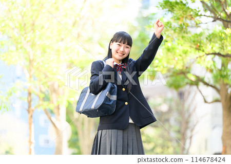 High school girl commuting to school, fresh greenery, fist pump High school girl commuting to school, fresh greenery, fist pump 114678424