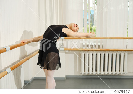 Woman makes backside body bent Woman makes backside body bent 114679447