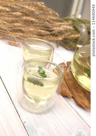 Herbal tea by the window Herbal tea by the window 114680948