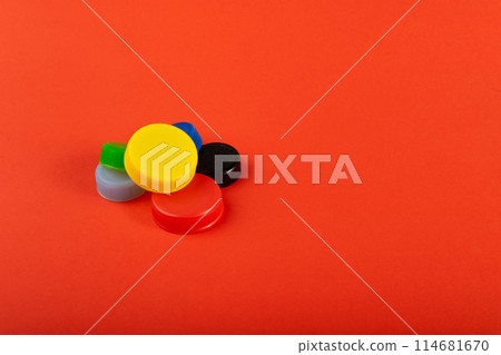 Plastic Bottle Caps Pile. Recycling HDPE Material Group, Circle Polyethylene Lid Set, Colorful Caps Group Plastic Bottle Caps Pile. Recycling HDPE Material Group, Circle Polyethylene Lid Set, Colorful Caps Group 114681670