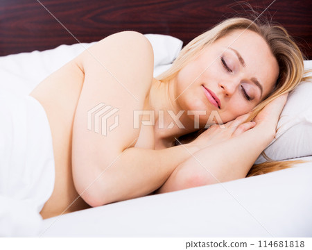 Naked woman sleeping in the bedroom Naked woman sleeping in the bedroom 114681818