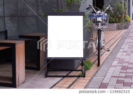 Large blank billboard on a street wall, banners with room to add your own text 114682523