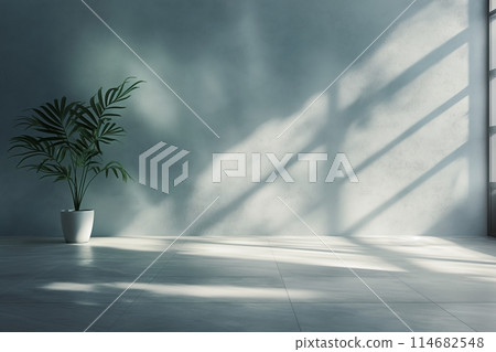 A minimalist space with a concrete wall, large windows, and a potted plant 114682548