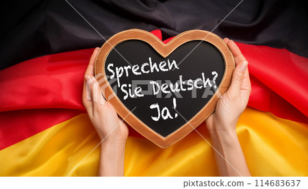 Blackboard with Text Do You Speak German and Yes Against a German Flag - Generative Ai 114683637