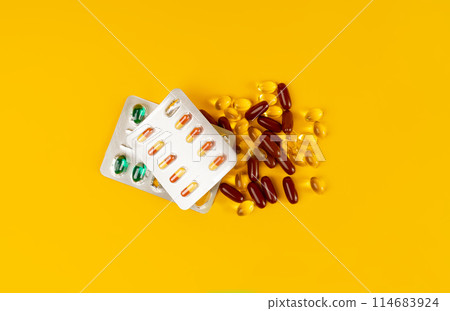 Pill Blister on Color Background, Silver Medicine Capsule Package, Drugs Packaging, Pill Pack Pill Blister on Color Background, Silver Medicine Capsule Package, Drugs Packaging, Pill Pack 114683924