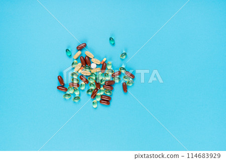 Color Pill Capsules on Color Background, Analgesic Pile, Transparent Painkiller Drugs Mix, Sedative Pills 114683929