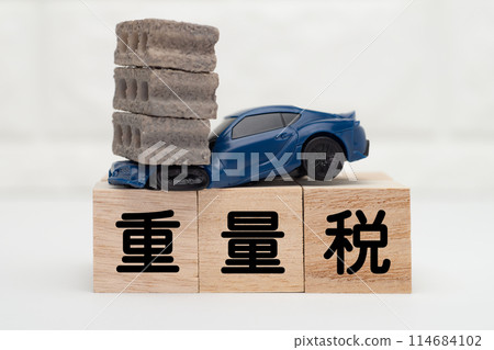 Image of cars being crushed by weight tax 114684102