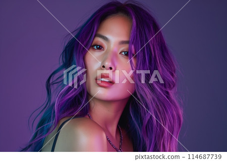 Captivating portrait of a woman with lush purple hair, gazing intensely in a violet-lit setting 114687739